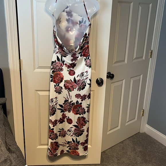 NWOT! Gorgeous silky asymmetrical dress. Has a draped scoop back. - Picture 3 of 11